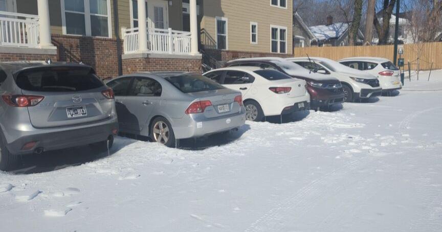 Jackson residents struggle to free cars from ice as snow lingers