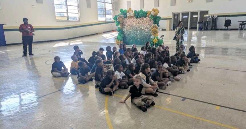 Jackson Central-Merry Elementary students build home libraries
