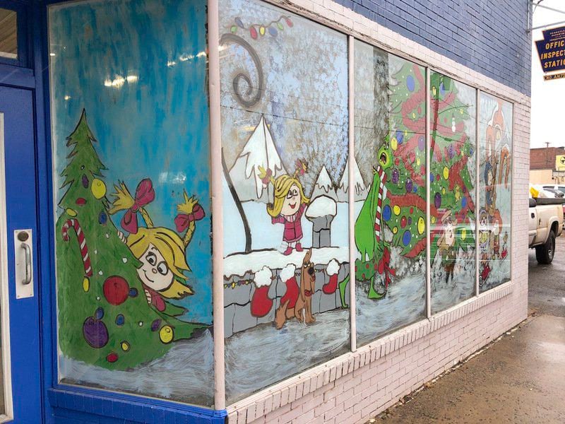 A painting for the season McCoy Tire window scenes near 40 years