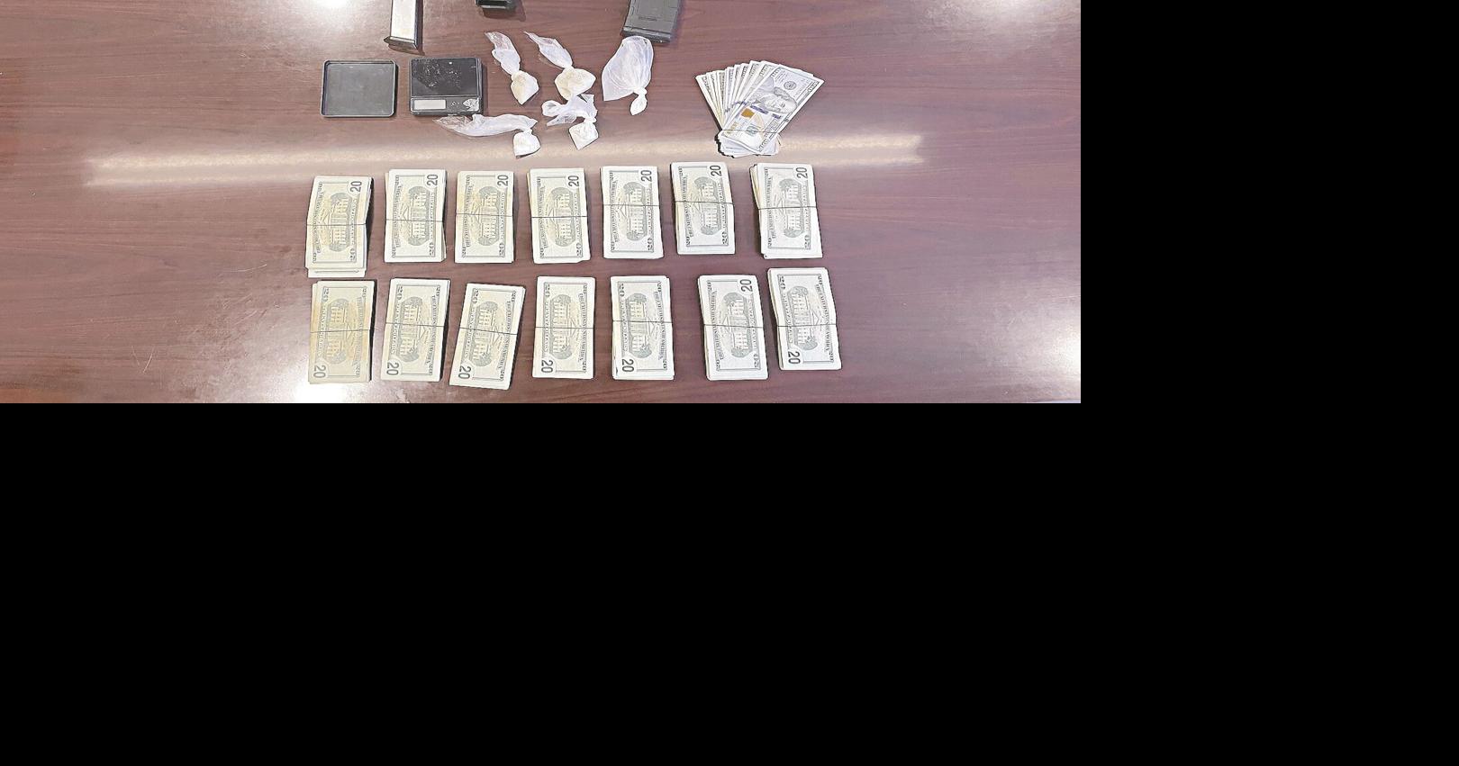 UPDATE: Police seize cash, gun, drugs in morning raid | Local News ...