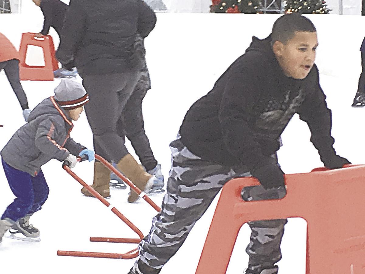 Skating with a hero: Local youth take to the ice with first responders