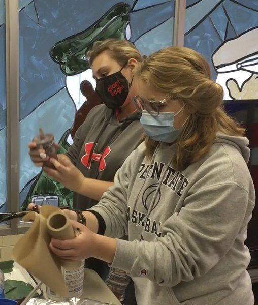 Shenango students paint veterans mural on Legion windows
