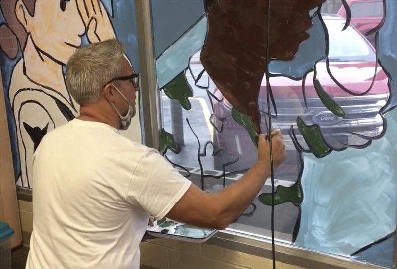 Shenango students paint veterans mural on Legion windows