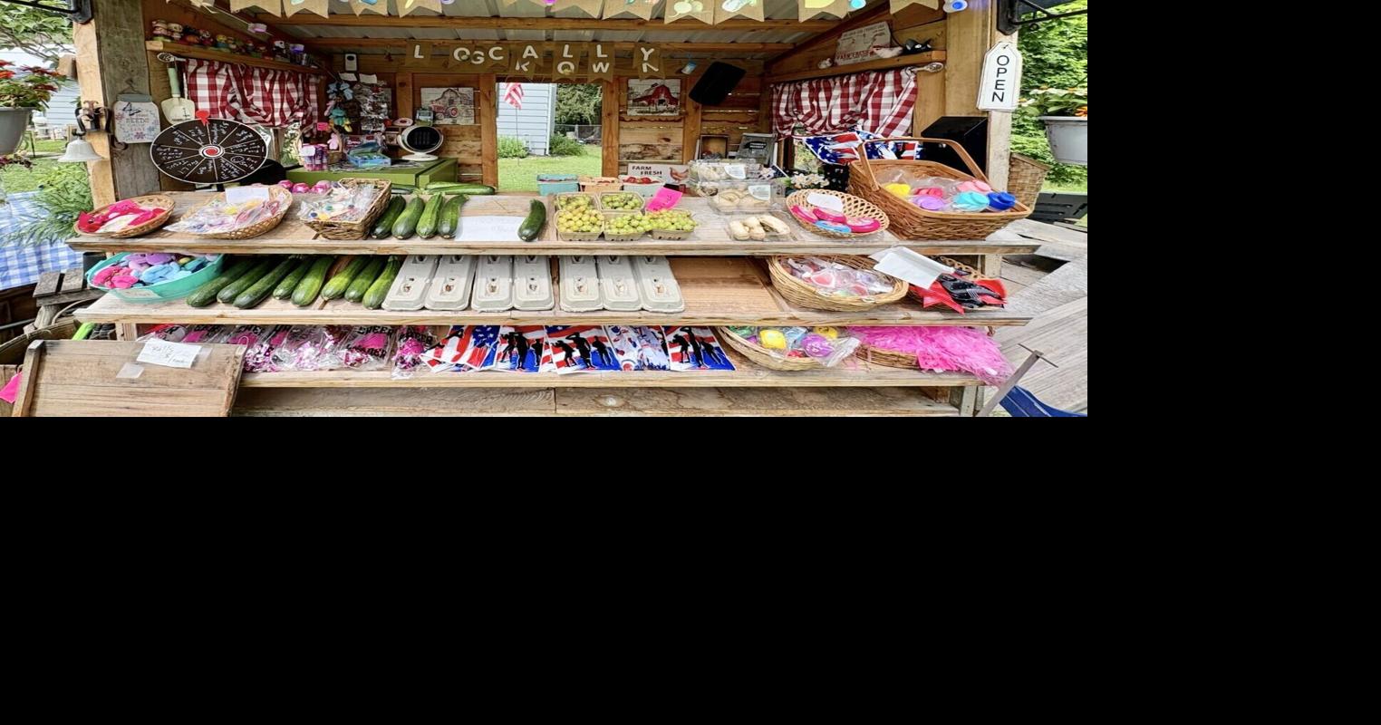 An 8-year-old's veggie stand has budding revenue