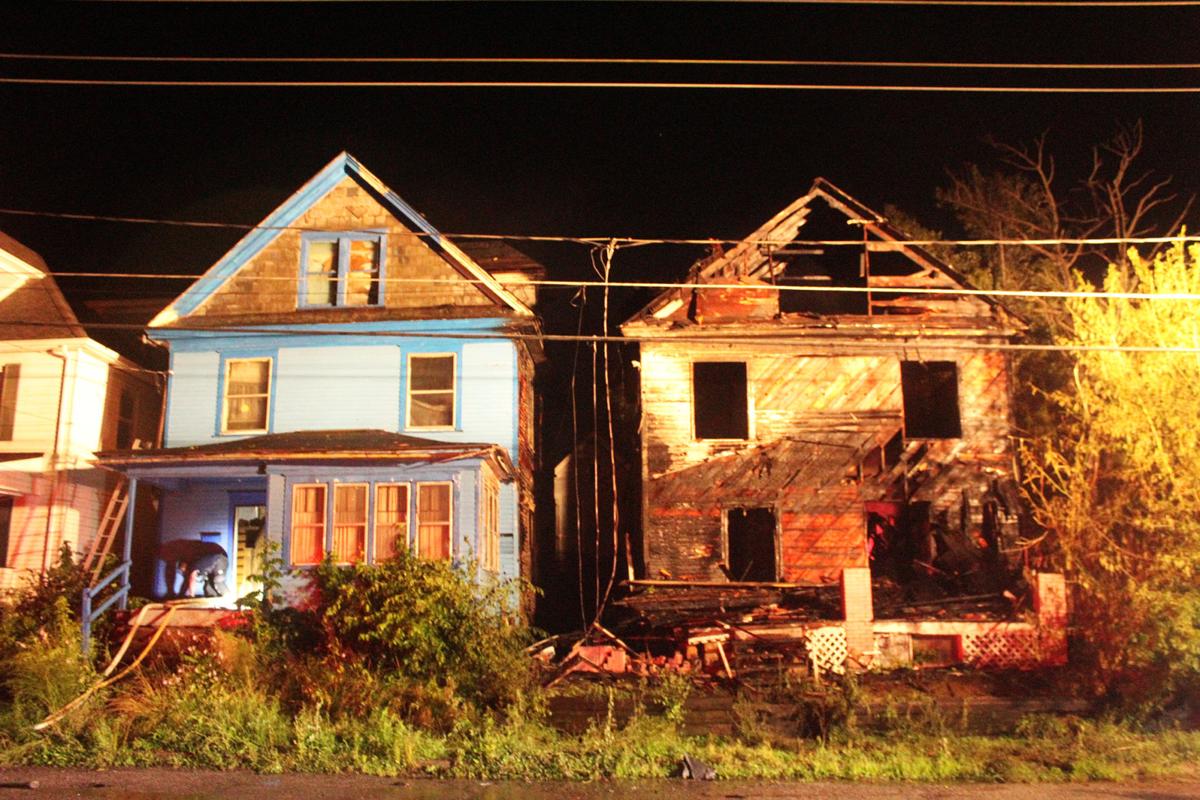 Burned homes on East Side demolished Local News