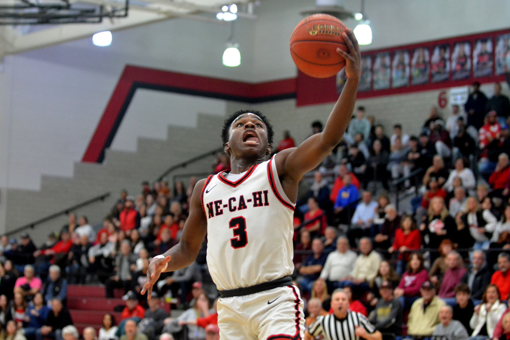 New Castle High Boys Basketball Team Secures Section Win with Harris