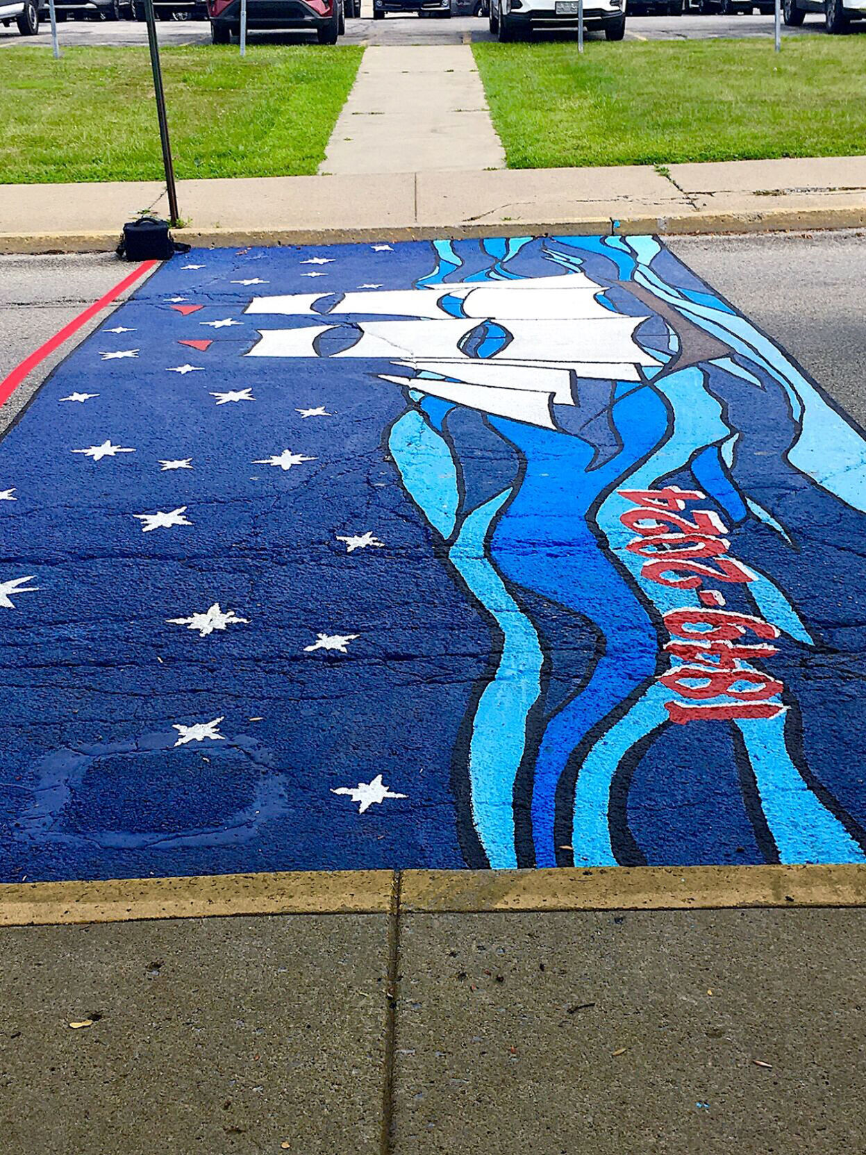 Participants cut ribbon for street mural | Local News | ncnewsonline.com