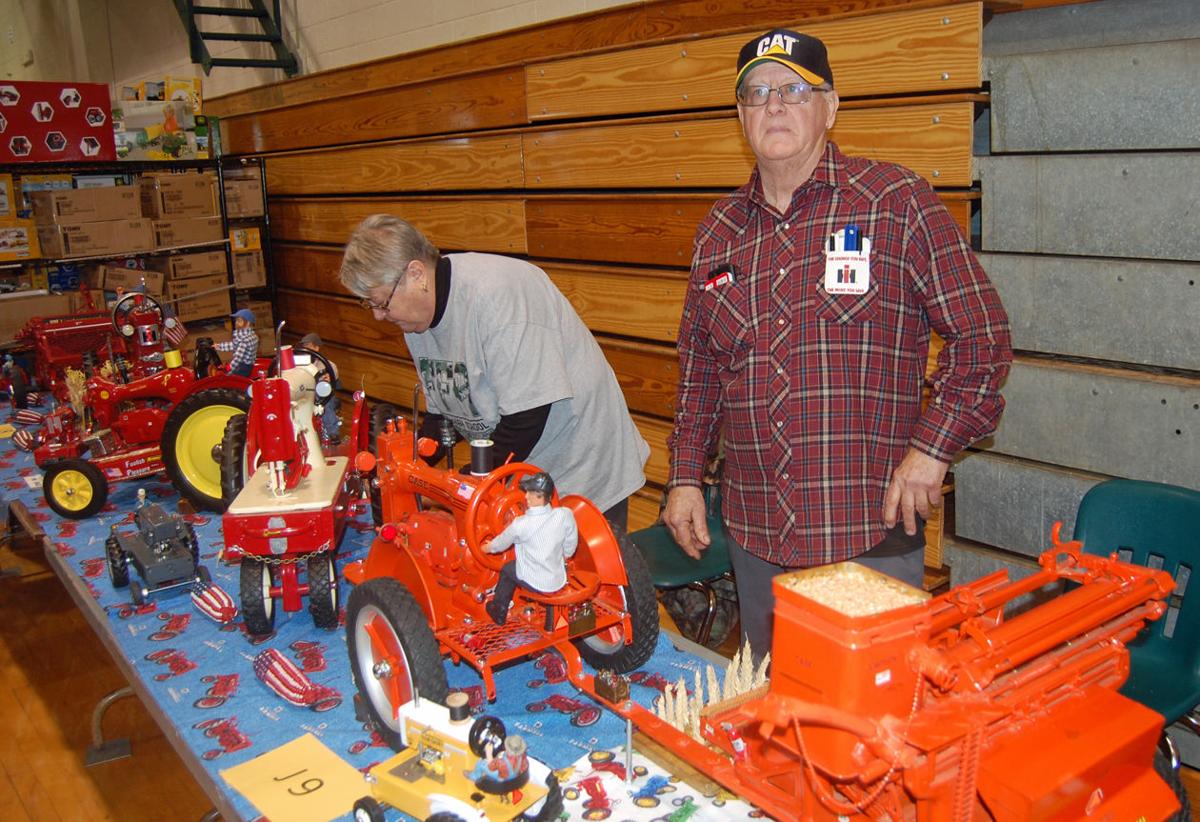 Crowds plow through growing farm toy show News