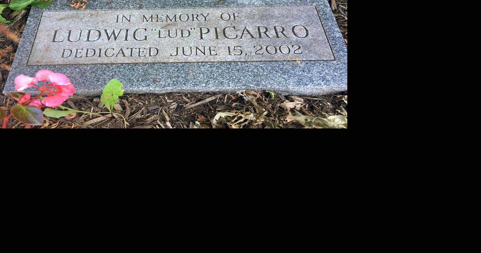 Flag pole, marker recall 9/11 victim
