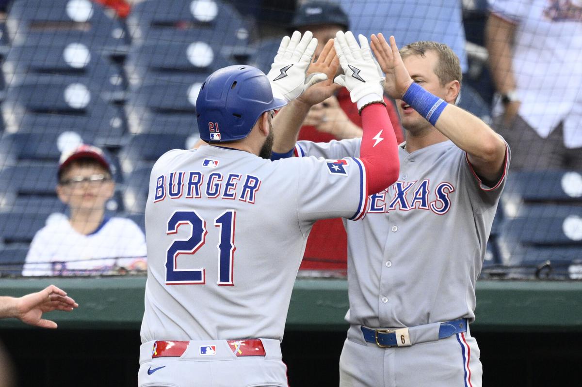 Rangers place Jake Burger on the injured list | National Sports |  ncnewsonline.com