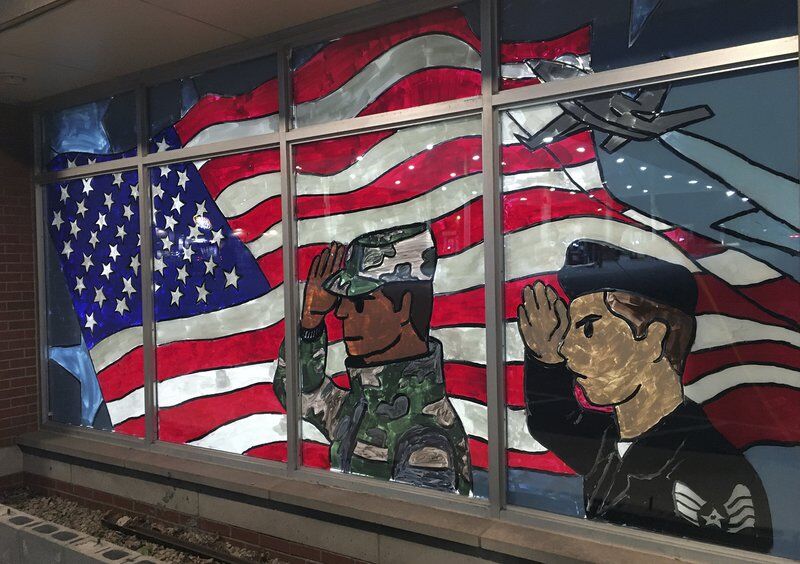 Shenango students paint veterans mural on Legion windows