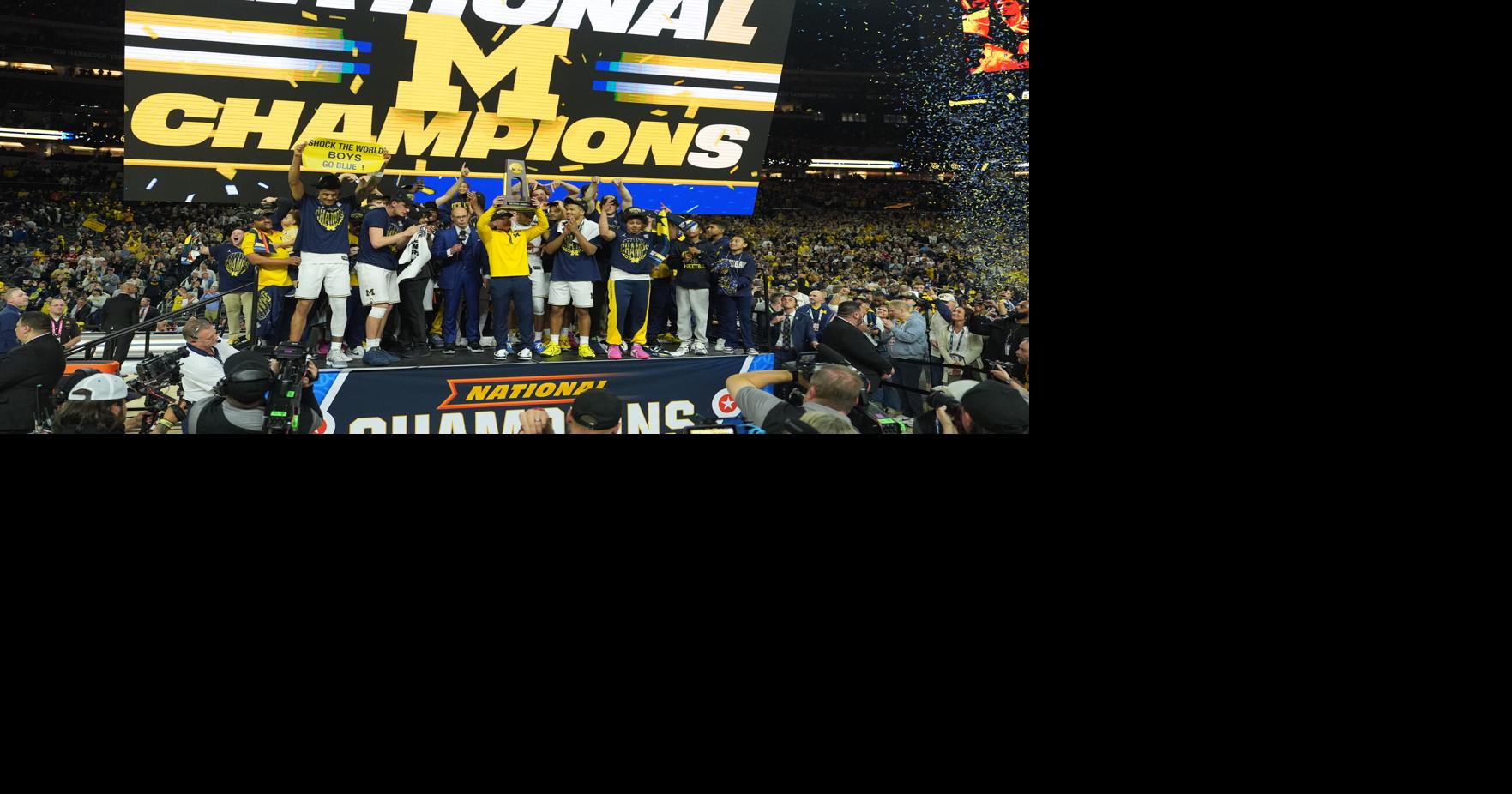 Michigan muscles its way to program's 2nd national title, beating stubborn UConn 69-63