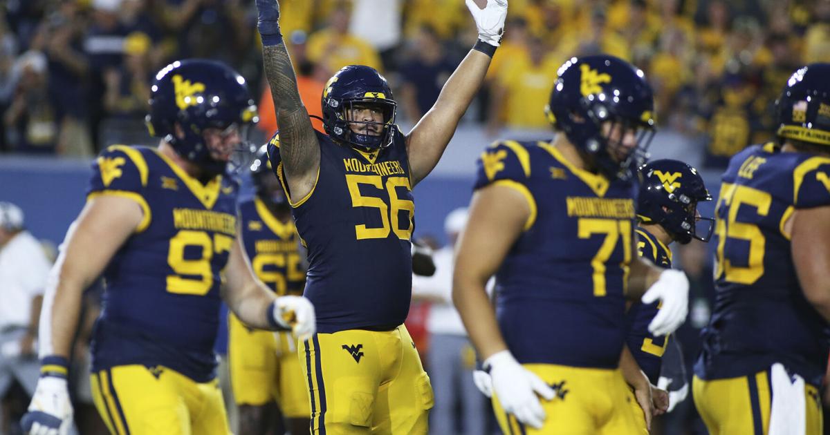 COUNTRY ROADS! West Virginia rallies past Pitt in overtime