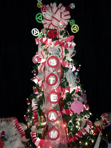 This year, Dow Chemical Co. has introduced a new, creative way to continue  the Christmas tree tradition in the form of Stak Trees made from Styrofoam-brand  foam. (Photo by Lew Stamp/Akron Beacon
