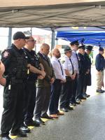 Police, officials, public pay homage to fallen officers