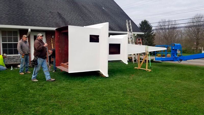 Church erects steeple to honor late pastor