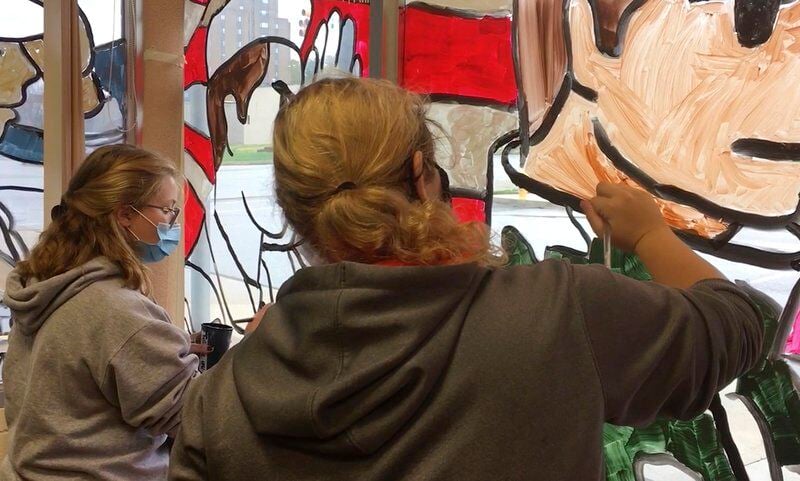 Shenango students paint veterans mural on Legion windows