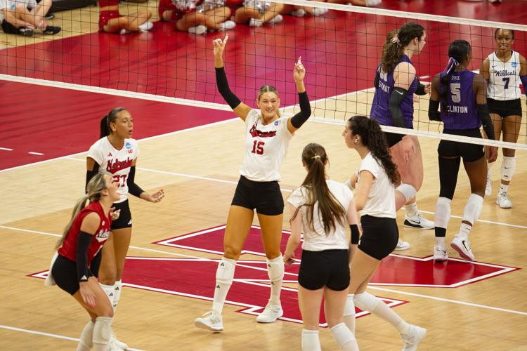 VOLLEYBALL: Andi Jackson celebrates