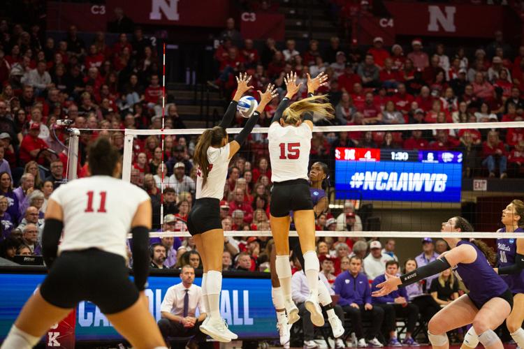 VOLLEYBALL: Harper Murray and Andi Jackson blocking