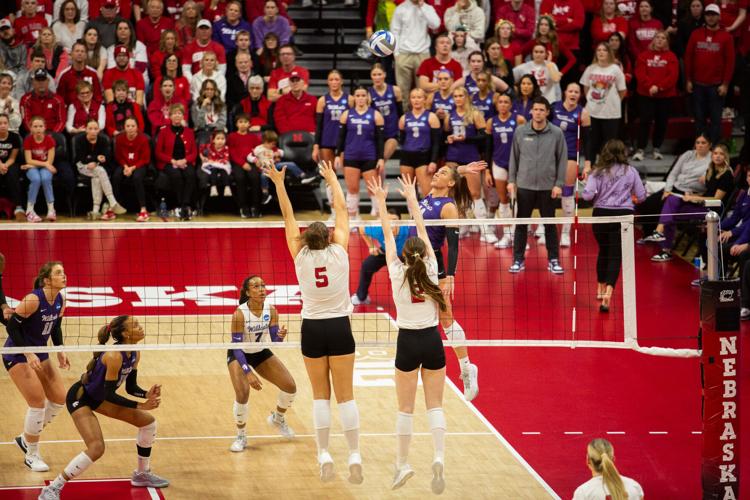 VOLLEYBALL: Rebekah Allick and Bergen Reilly attempt to block