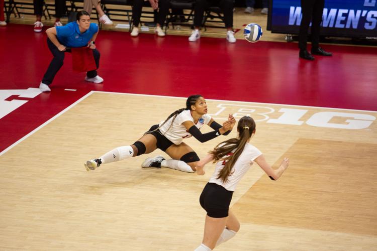 VOLLEYBALL: Taylor Landfair lays out for a dig
