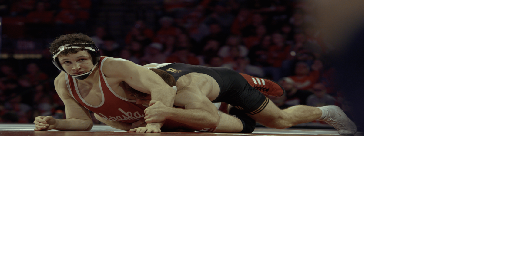 PHOTO: Huskers come up short-handed to cross state rivals | Unlimited ...
