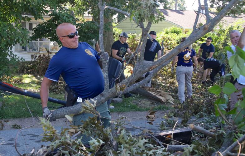 Volunteers help clean up storm debris in Brookside, Cherokee Woods ...