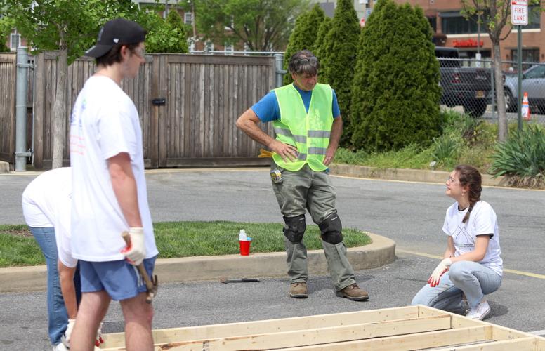 Building community 150 volunteers take part in Habitat for Humanity