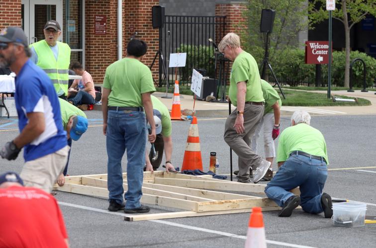 Building community 150 volunteers take part in Habitat for Humanity