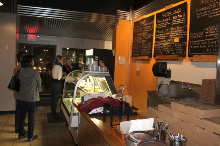 From wheels to walls Wood Fired Pizza moves inside News