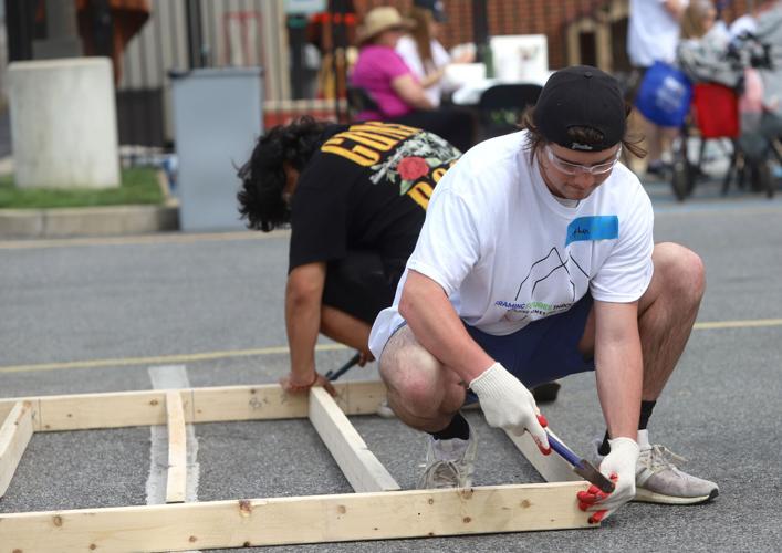 Building community 150 volunteers take part in Habitat for Humanity