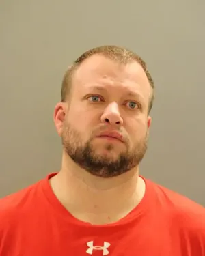 Man charged with burglarizing home in Robscott Manor