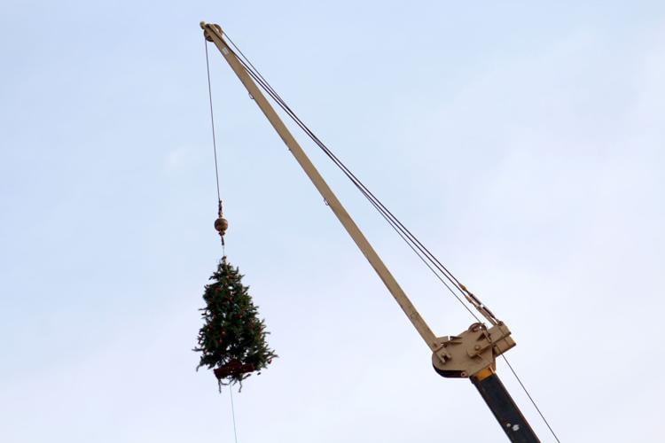 Newark construction company hangs Christmas from a crane News