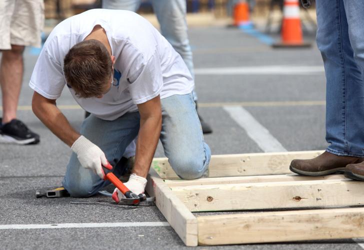 Building community 150 volunteers take part in Habitat for Humanity