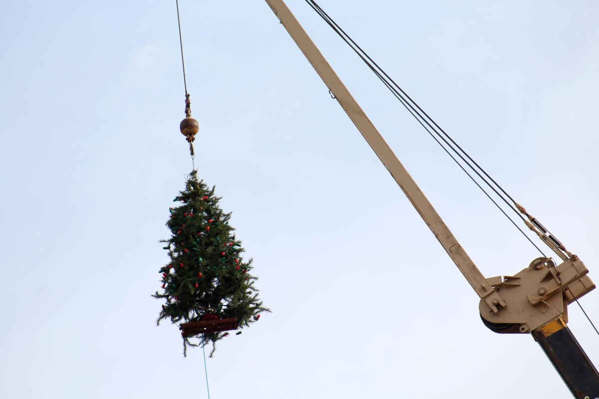 Newark construction company hangs Christmas from a crane News