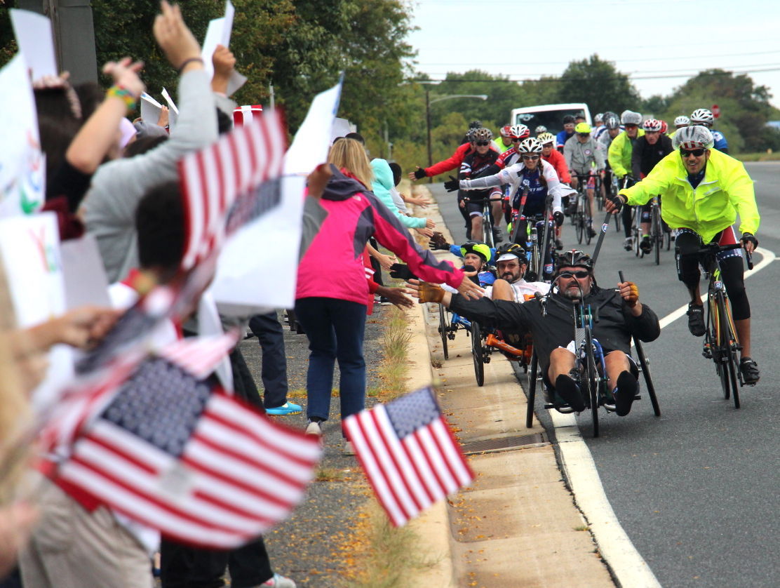 Kirk Middle students cheer as injured vets ride through Newark | News ...