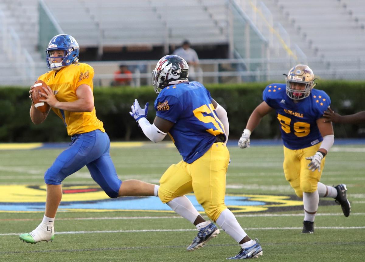 BlueGold Game unites football players, 'buddies' News Gallery