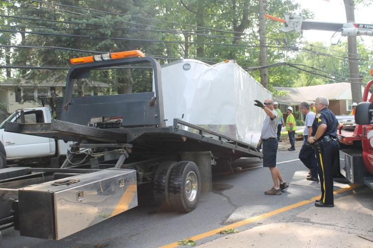 Driver charged after truck hits utility pole, tree on New London Road ...