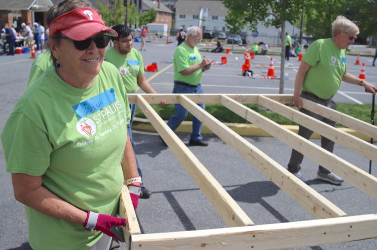 Building community 150 volunteers take part in Habitat for Humanity