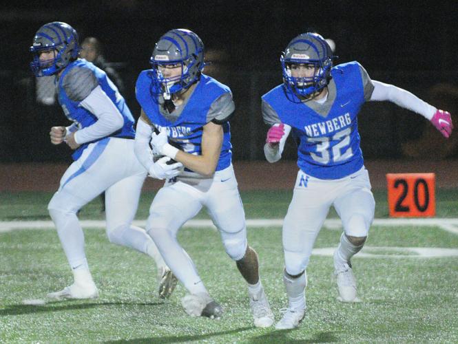 Newberg football uses last-minute score to outlast Grants Pass 36 