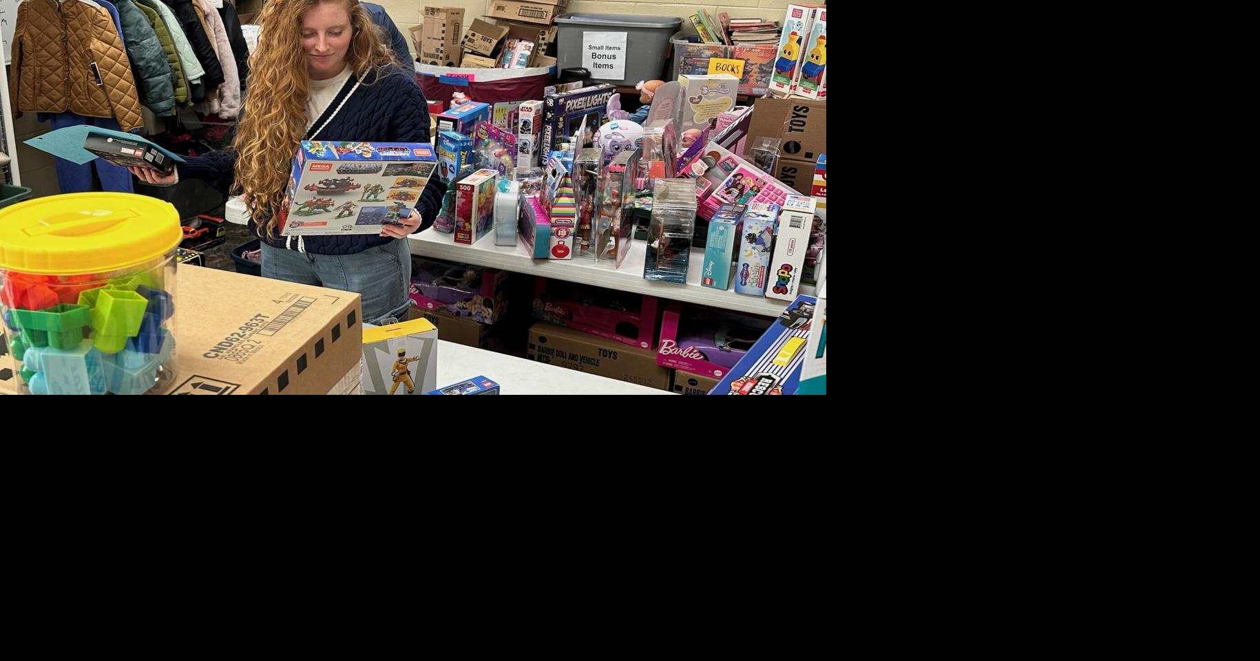 Giving 'joy and hope' at Christmas: Hundreds of children receive Angel Tree gifts