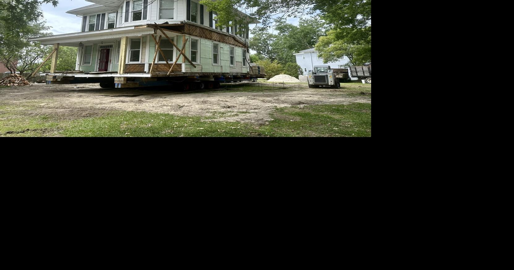 Workers move 600,000 pound Tisdale House from Broad Street to begin