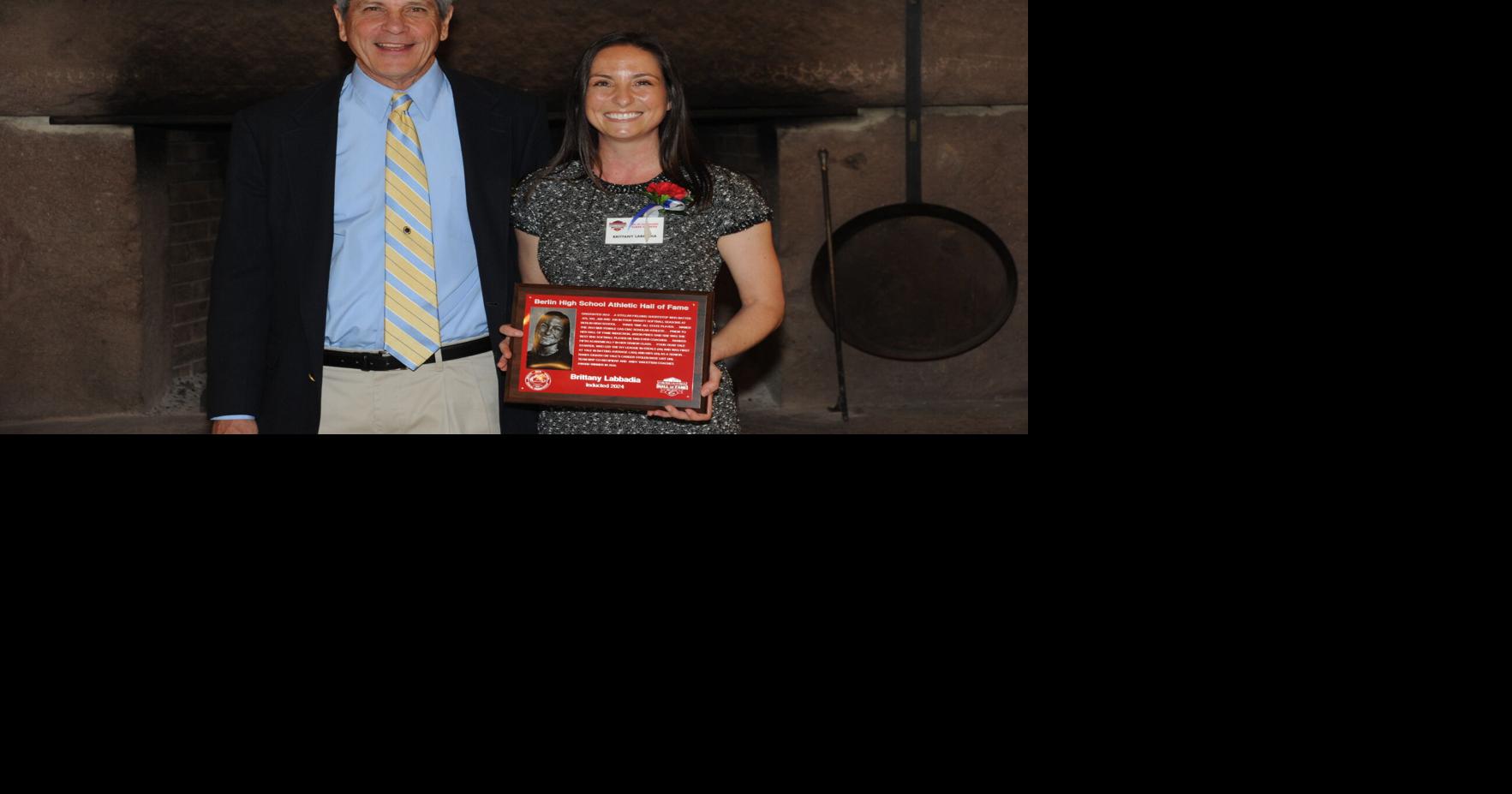 Brittany Labbadia being presented her plaque at the Aqua Turf. Sports