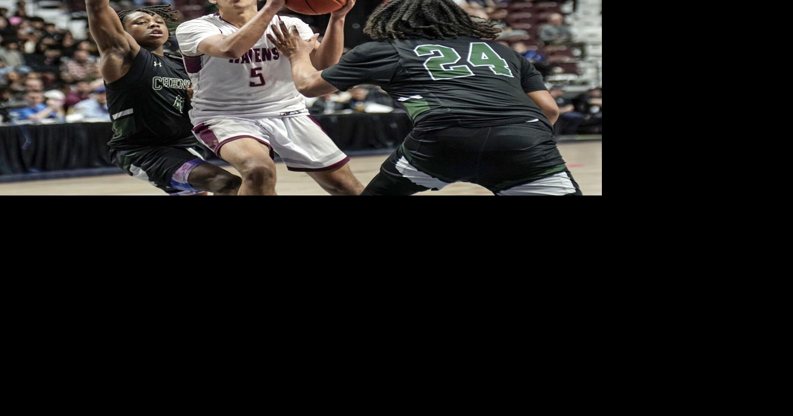 Innovation senior Jamal Kulaib defended by Cheney Tech defenders in the