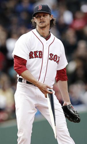 Boston Red Sox Shane Victorino reacts after fouling out to