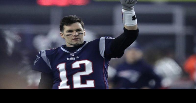 PATRIOTS STAR QUARTERBACK TOM BRADY IN THROWBACK UNIFORM 2