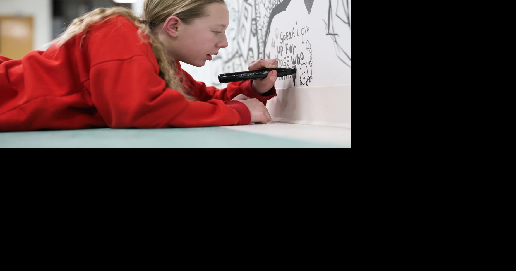 Speaking out through art: Amesbury nonprofit lets visitors paint messages on its walls