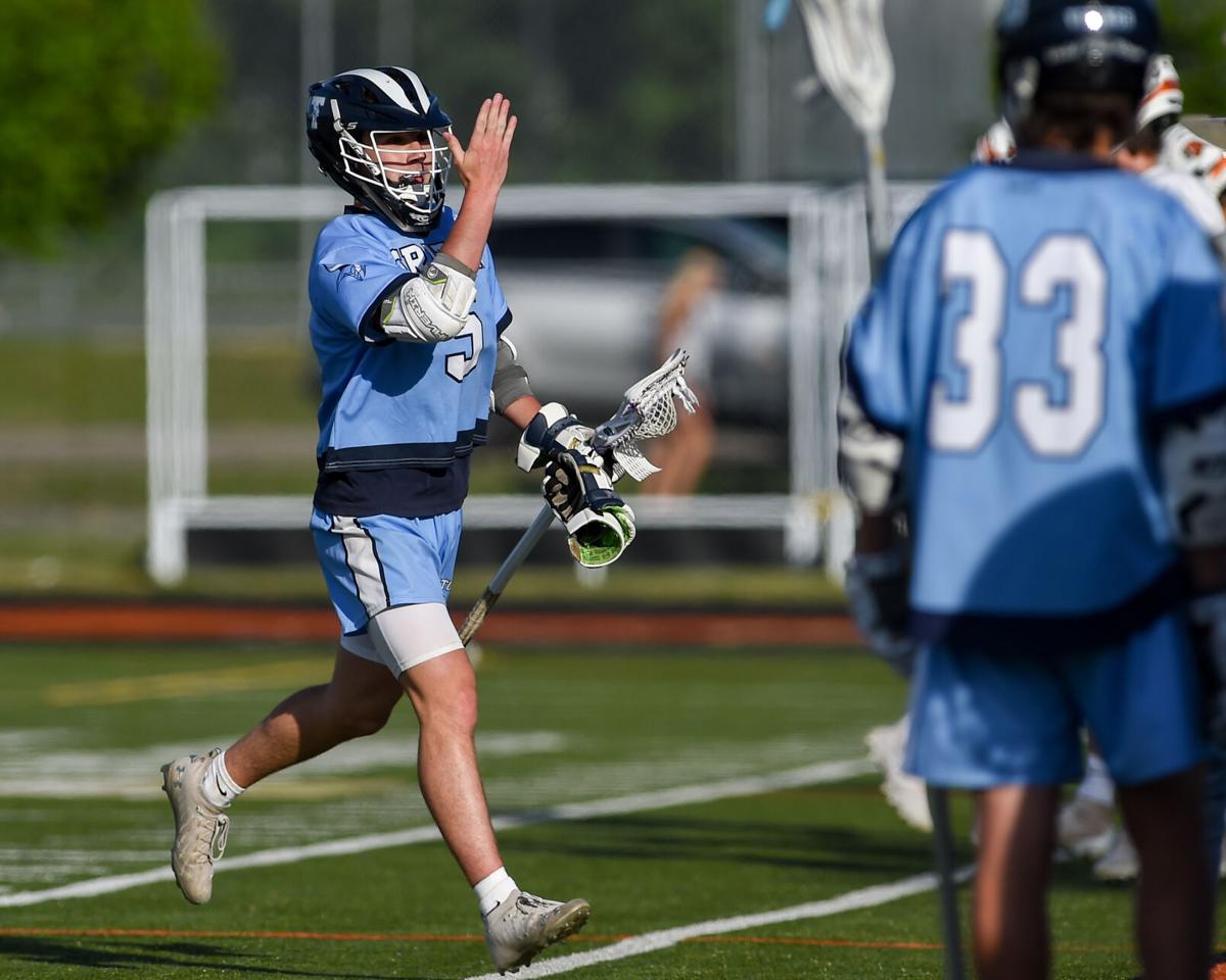 Triton at Ipswich boys varsity lacrosse game