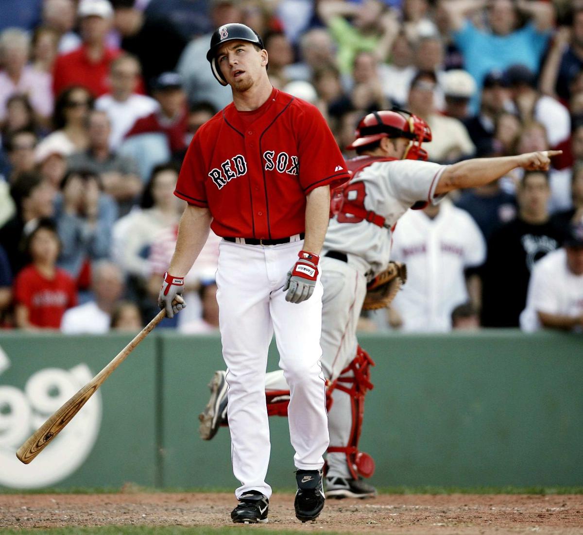 Los Angeles Angels short stop Orlando Cabrera makes the throw to first  baseman Casey Kotchman on a ground out by Boston Red Sox batter Mike Lowell  in the third inning of game