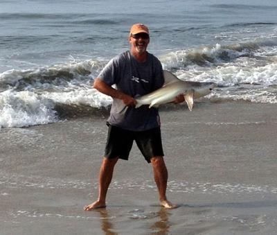 Readington fisherman lands 30-pound sand reef shark at the Jersey